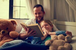 parent reading to child.